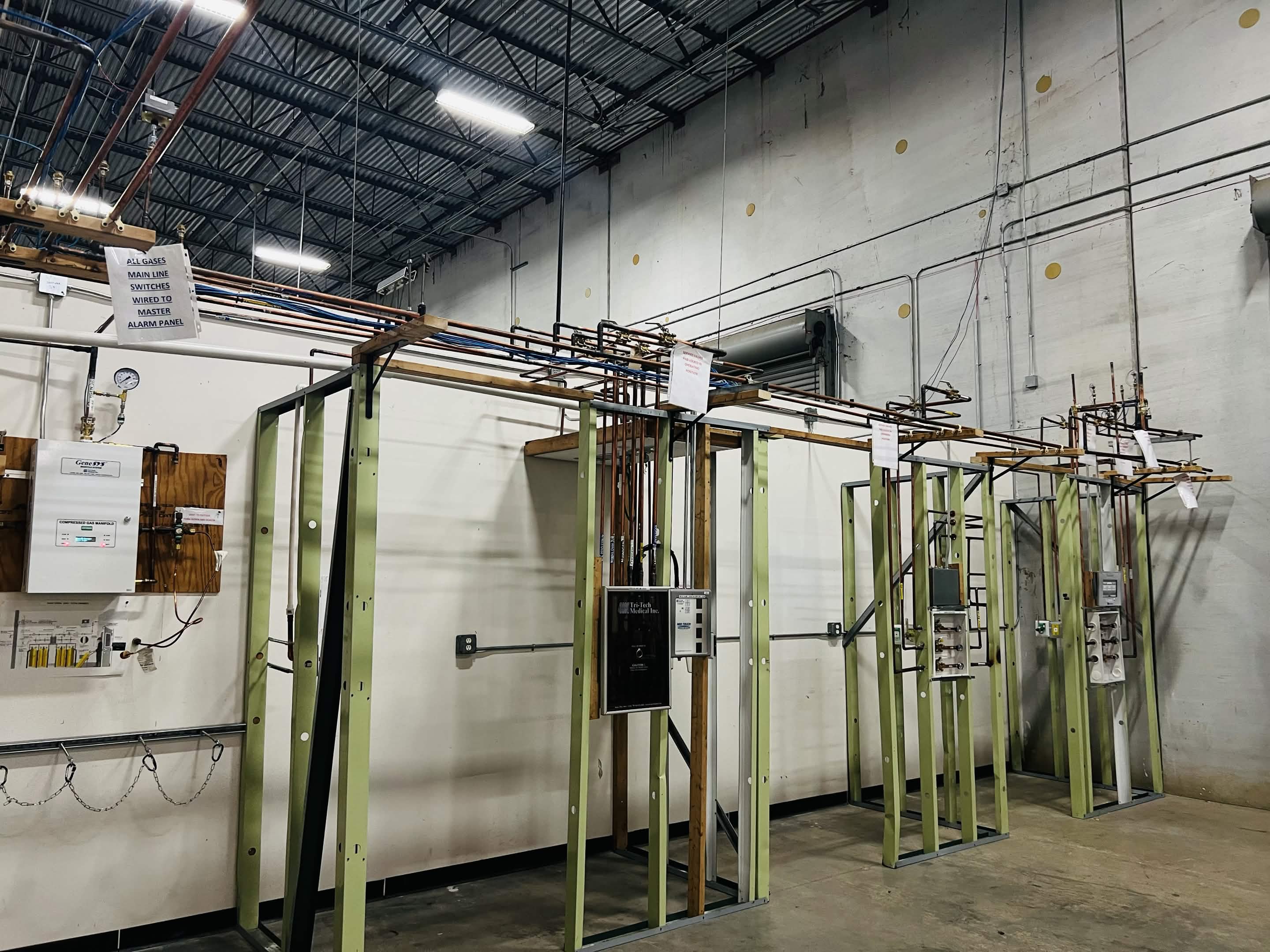 Medical gas systems training lab with wall piping assemblies